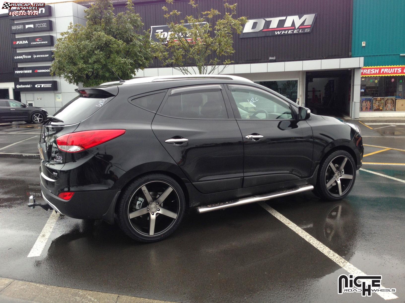 vehicle gallery/hyundai lx35 niche milan m134 suv  Black & Machined with Dark Tint wheels and rims